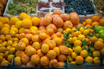 Naklejka na ściany i meble Fruit market with various colorful fresh fruits and vegetables
