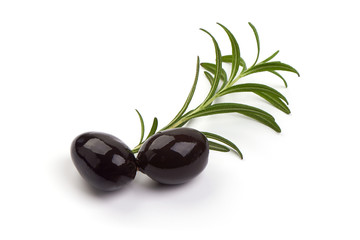 Fresh branch of rosemary herb with olives, isolated on white background