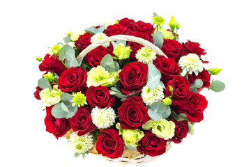 red roses on a white background composition of red roses in a basket