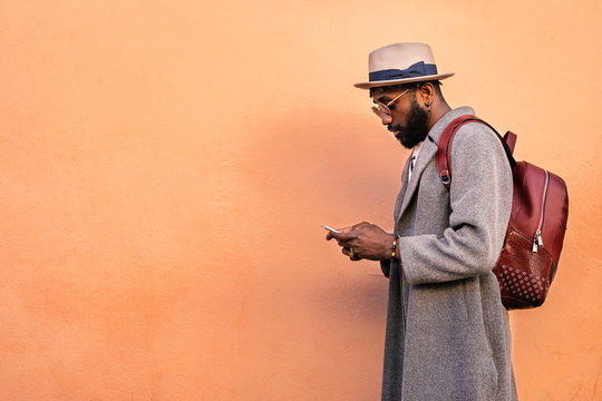 African man using mobile phone