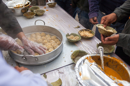 Selling dumplings (momos) during a food festival.