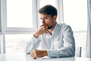 businessman sitting at desk in office
