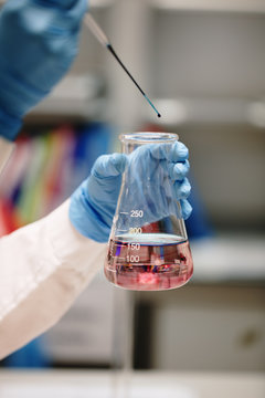 young woman doing chemical experiments