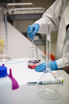 young woman doing chemical experiments