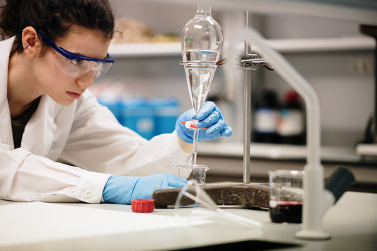young woman doing chemical experiments