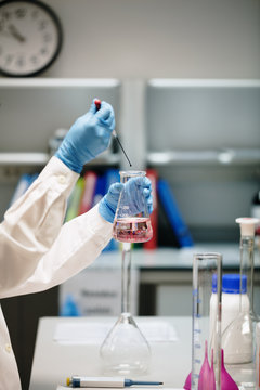 young woman doing chemical experiments