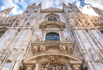 Milan Cathedral in Italy, known as Duomo di Milano is the largest and most complex Gothic building in Italy. Catholic church made of white marble.