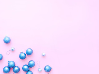 Silver Christmas balls on pink background