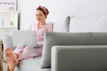 Young woman shopping online at home