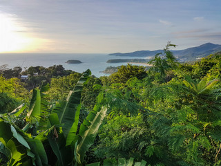 Tropical beach landscape. Beautiful coast scenery on tropical island with paradise beaches. Phromthep cape viewpoint in Phuket, Thailand.