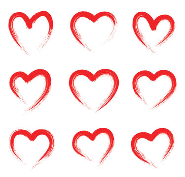 Grunge red heart shape. Hand drawn vector hearts. Drawing with a brush in the shape of heart - stock vector.