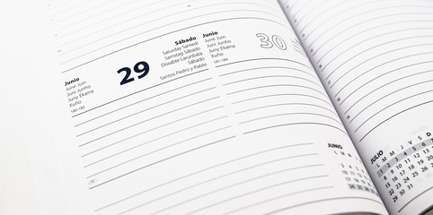 Fototapeta premium Work agenda with identification of the day and month in official languages of Spain