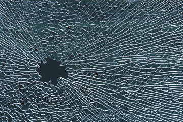 Broken tempered glass, a hole in the window glass or car windshield