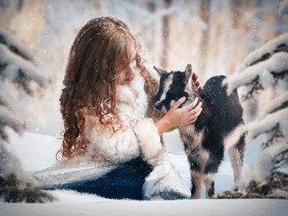 A fairy tale about a girl and a little goat under the snow © kozorog