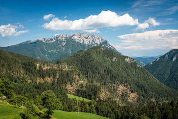 Naklejka premium View over hills to Podolševa to mountain Raduha in Slovenia
