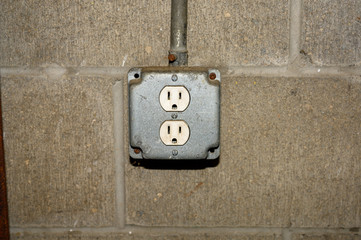 Old plug on wall