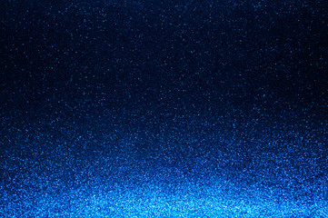 Navy blue abstract light background,dark blue bokeh shining lights,sparkling glittering Christmas...