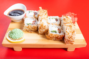 Dried tuna breading roll with various fillings. Close-up.