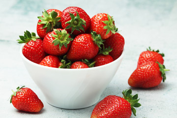 A bowl with ripe bright strawberry	