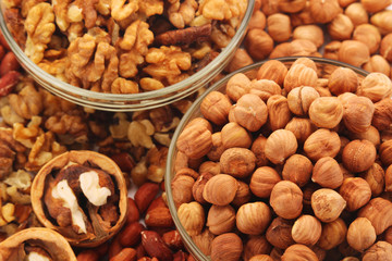 Different nuts in glass cups	