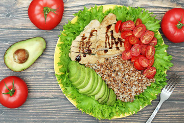 Turkey breast, avocado, salad and buckwheat as healthy lunch