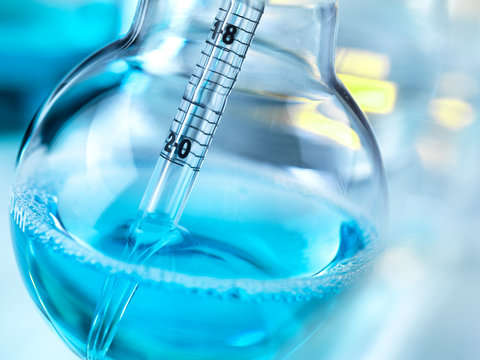 Close-up of sample in flask at laboratory