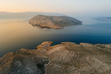 Aerial view of Krk island against clear sky during sunrise, Croatia