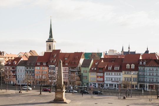 High angle view of residential buildings and church against sky in Erfurt, Germany