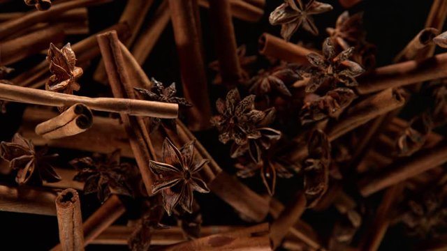 Super Slow Motion Shot of Cinnamon and Star Anise Explosion on Black Background at 1000fps