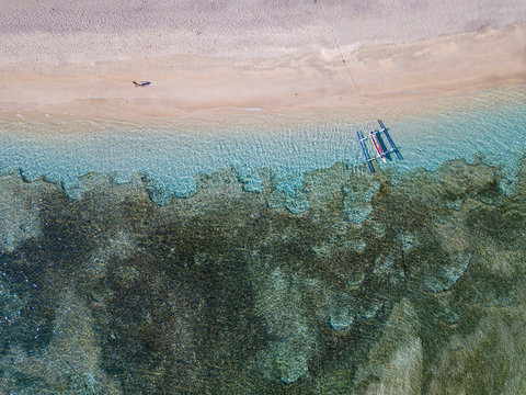 Aerial view of outrigger moored at beach in Bali, Indonesia