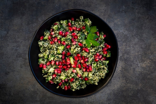 Directly above shot of pomegranate salad served in plate on table