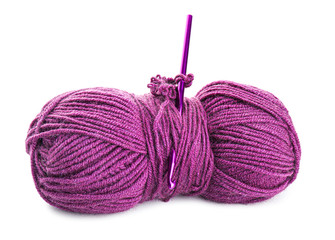 Knitting yarn and crochet needle on white background