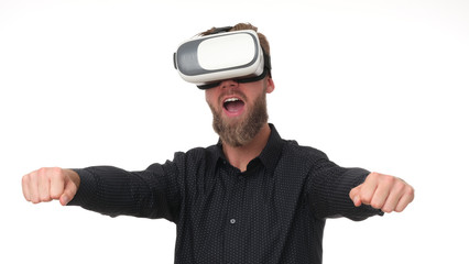 Fototapeta premium Man wearing VR goggles. Full of expression.