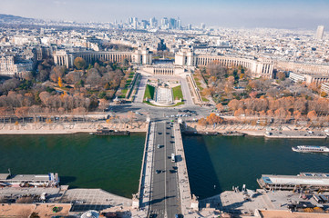 Fototapeta premium Paris, France, 11.21.2018 The Eiffel Tower. View from the height of the Eiffel Tower on the cityscape of Paris and the Trocadero Square in the autumn sunny day
