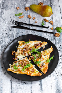 High angle view of pizza slices served in plate on table