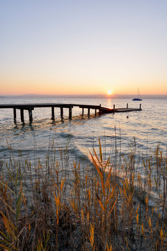 Pier over lake Ammersee against clear sky during sunset, Germany