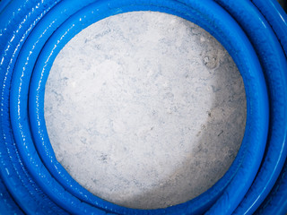 blue pipe insulation on concrete ground