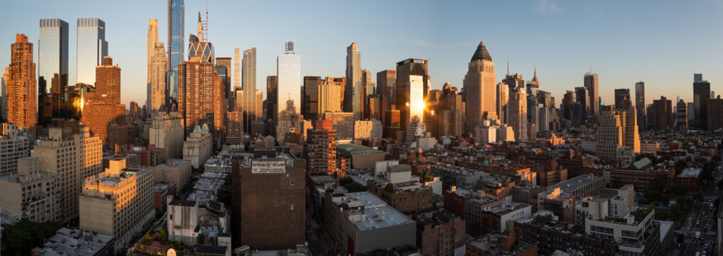 Sunset panorama of Manhattan's Hell's Kitchen skyline as seen from the 10th Avenue, Midtown Manhattan, New York City. Taken on September the 25th, 2019.