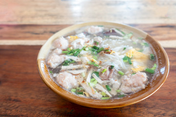 Eating Paste of rice flour on a wooden table detail food.
