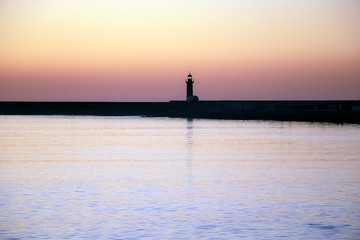 Fototapeta na wymiar Lighthouse in Douro River estuary, Porto, Portugal. 