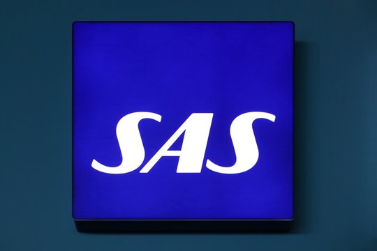 Copenhagen, Denmark - May 20, 2018: SAS logo on a wall. Scandinavian Airlines, usually known as SAS, is the flag carrier of Sweden, Norway, and Denmark, which together form mainland Scandinavia