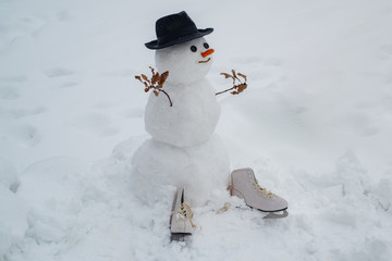 Happy smiling snow man on sunny winter day. Snowmen. Snowman. Happy funny snowman in the snow....