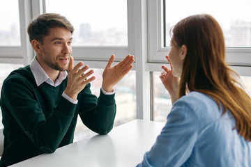man and woman shaking hands
