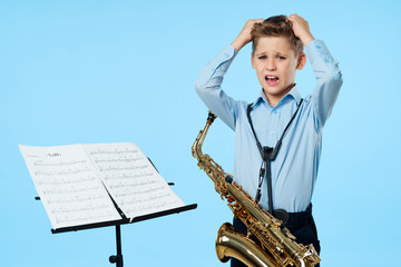 boy with saxophone