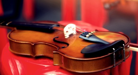 violin and bow on black background
