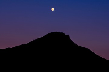 Moon over Colorado mountain
