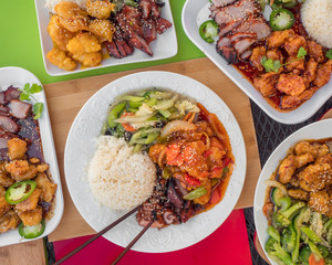 Chinese food in America. Classic Americanized Chinese food; beef and broccoli, orange chicken, sesame chicken, fried shrimp, and pork spare ribs. Unhealthy but delicious food for takeout.