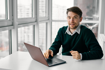 businessman working on laptop in an office