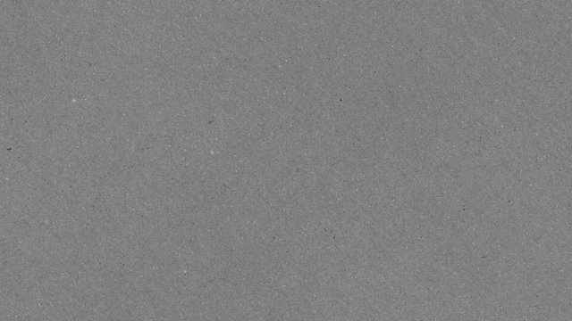 Grunge grainy texture of grey cardboard. Neutral 50 percent grey base. Great for overlay blending mode. Seamless loop animation
