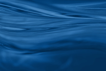 Abstract blurred soft focused futuristic dark blue wavy background. 2020 trend color concept